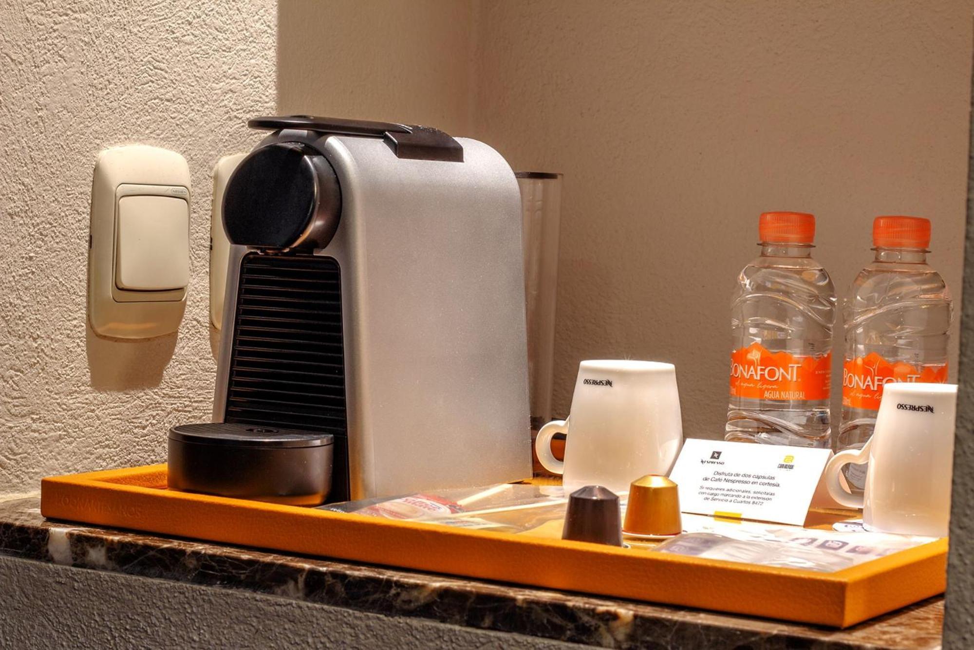 Camino Real Pedregal Mexico Hotel ภายนอก รูปภาพ A Nespresso coffee machine in a hotel room